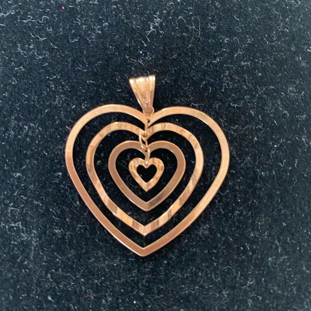 14k rose gold heart pendant.